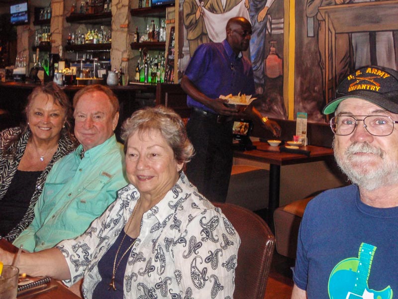 L-R: Jim and Connie Wallner, Allegra Burnworth, and Marvin Howard with Casey in the background.