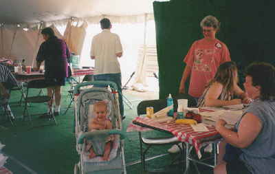 Proud Grand Ma looks on.