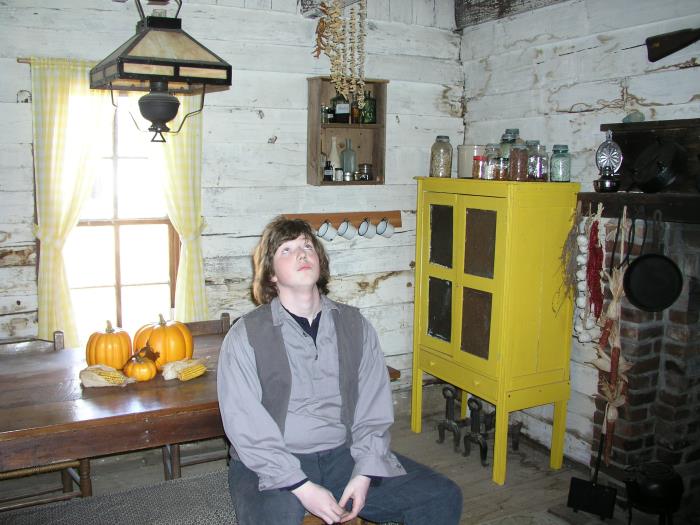 Samuel explains some of the items in the kitchen