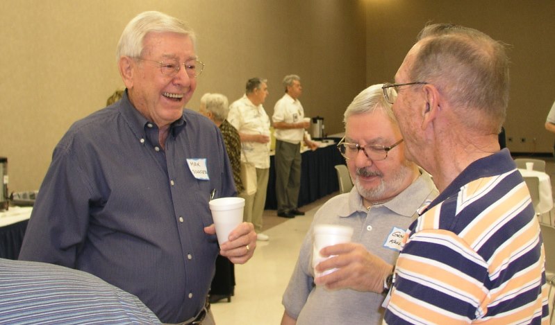 Max Schaeffer enjoys a laugh with Gil McCombs