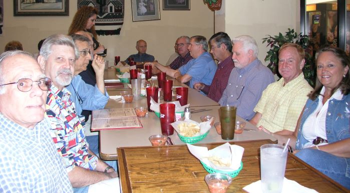 L-R: Mike Crye, Larry Pavlicek, Bob Everett, Marvin Howard,
     Marilyn, Bill England, John Volkman, Don McFaddin, George Huling, Rex Stephens, Ray Housley, Jim Wallner, Connie Wallner