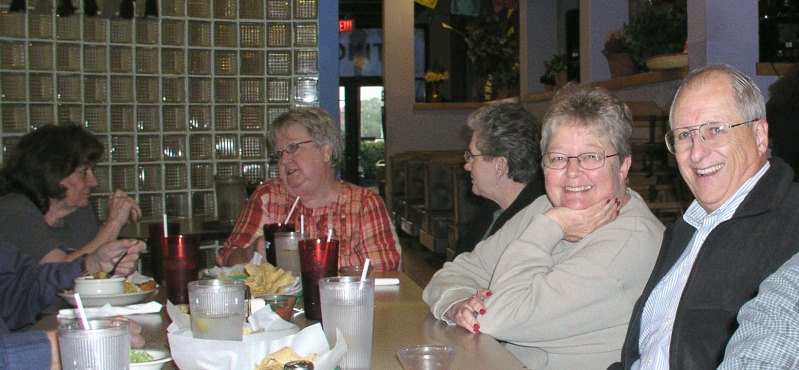 Clockwise around the tables from lower left: Bob Everett, Gerry Brown, Marvin Howard,Francis Bradford, Carol George, Dorothy McGrath, Wanda Fox, Dennis Kaplan, Mike Crye, Eldon Streck, Doug Dreggors, Jack Bowling, George Huling, and Doug Sloan