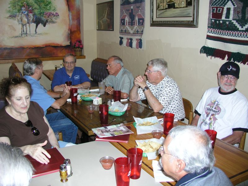 Clockwise: Charlotte Karam, George Huling, Dennis Kaplan, Mike Crye, Jim Rushing, Marvin Howard, Mauricio, Nuez