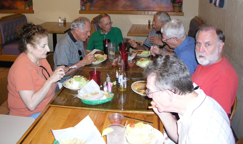 Clockwise from left: Charlotte Karam, Mike Crye, Doug Dreggors, Nuez, Jim Rushing, Jerry Brown, and Jack Bowling