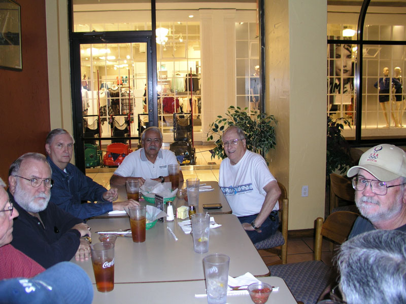 Clockwise starting with the blue cap: Harold Shiroma, Jim Rushing, Jerry Brown, George Huling, Mauricio Nuez, Jim Harrison, Marvin Howard, Robert Everett. 