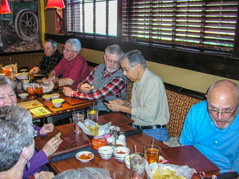 At left, Allegra Burnworth and Frances Bradford. On the far side of the table from left to right: Dave Kuester, Jim Rushing, Larry Pavlicek, Bob Everett, Rod Barnes