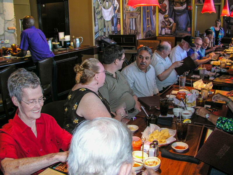 Casey at the bar and clockwise from the bottom: Charles "Red" Merritt, Betty Merritt, Amy Gehr, Klaus Gehr, Victor Elizondo, 
     Terry Freeman, Marvin Howard, Jerry Brown, Mike Crye, Ken Mitchell, Doug Dreggors, Craig Dickey, Connie Wallner