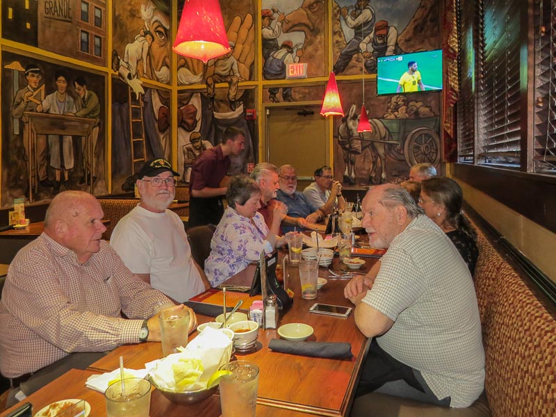 Clockwise around the table from lower left: John Plant, Marvin Howard, Allegra Burnworth, Larry Pavlicek, Jerry Brown, Ken Rogers, George Huling, Carol George, Connie Wallner, Terry Freeman