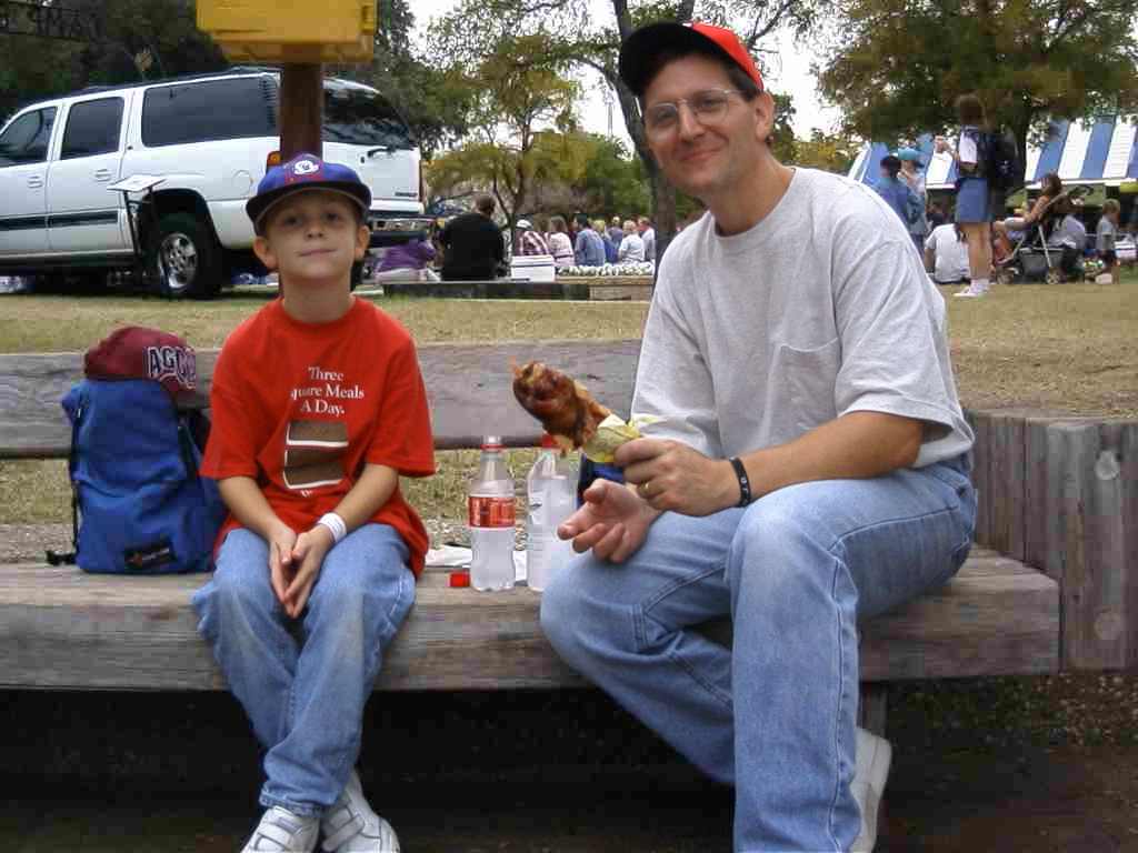 Larry Halbert and son. Right click to download a full sized copy. Left click to see a index of other State Fair pictures.