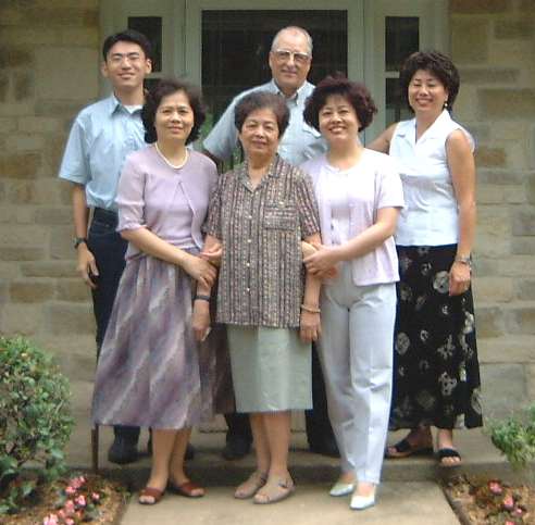 A family portrait on the front porch