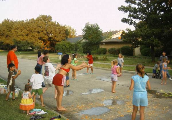 Tossing water baloons