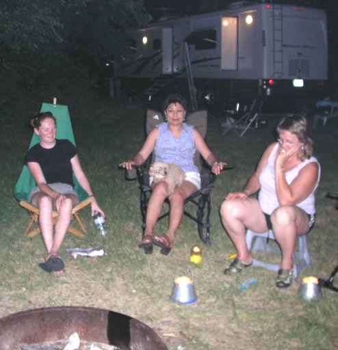Relaxing around the campfire after dinner