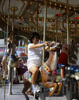 Angie and Jeannie just had to ride the Carousel