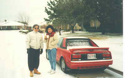 Angie and her father with Lorrie's MR2 after snow storm