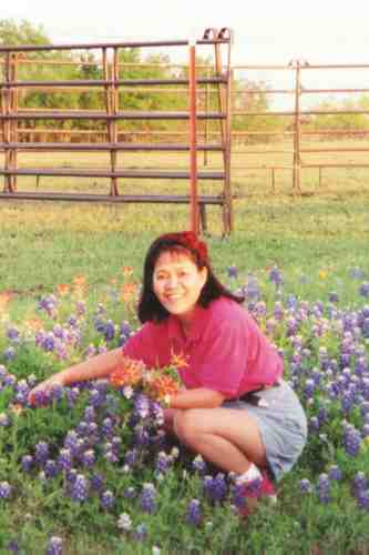 Nenette picks some wildflowers