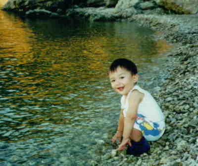 Eddie liked throwing rocks in the water